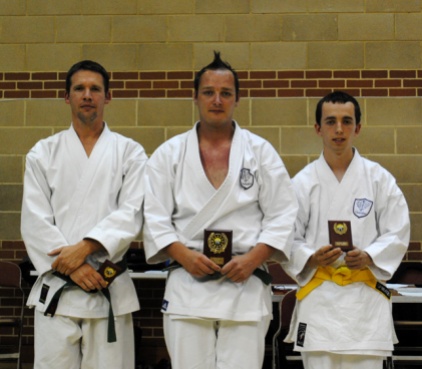 2013 - Craig Walton (centre) winner of the junior grade kata event 2013 Shikukai National Championships.