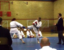 2011 Shikukai Championships, Swindon. Sue Dodd (R) fires a kick off against Laura Underwood in the ladies senior kumite.